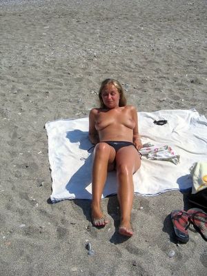 Busty mature women nudists in the sea