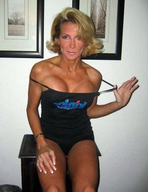 This blonde MILF brags of her little..